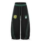 Omirad Soccer Crest Wide-Leg Track Pants