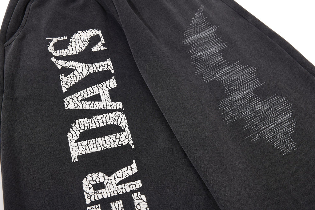 Omirad Cracked Logo Wide-Leg Sweatpants