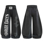 Omirad Cracked Logo Wide-Leg Sweatpants