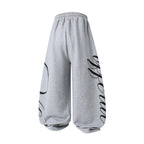 Omirad Studded Script Sweatpants